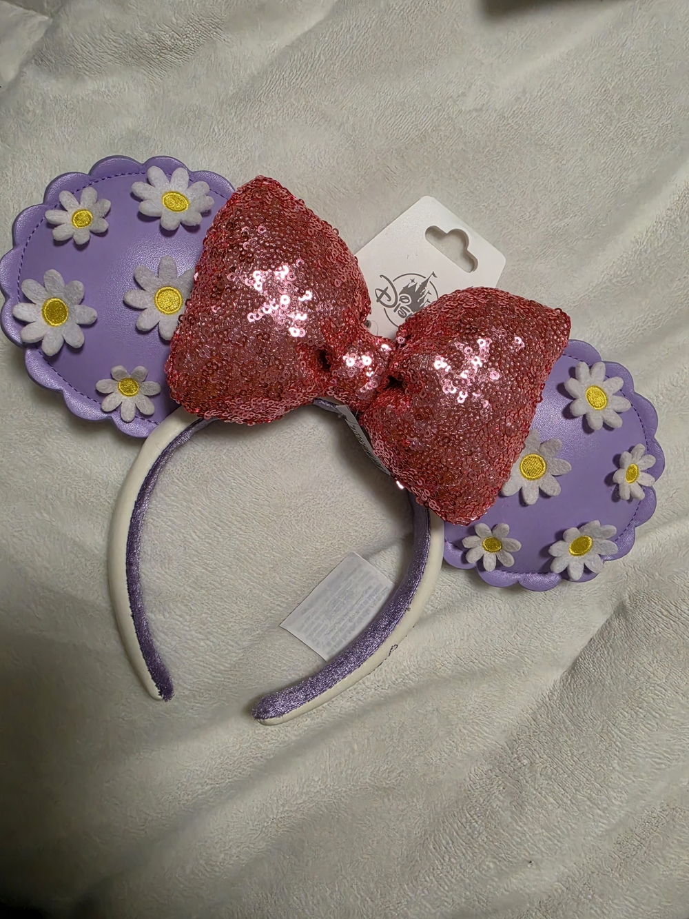 Disney Purple Daisy Ear Headband with Pink Sequin Bow